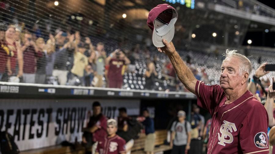 Florida State coach Mike Martin tips his hat and thanks the crowd following his team's 4-1 loss to Texas Tech at the College World Series on Wednesday, June 19, 2019, in Omaha, Neb. The loss eliminates the Seminoles and ends the 40-year coaching career of the 75-year-old Martin, who is retiring from his alma mater. [CHRIS MACHIAN   |   Omaha World-Herald]